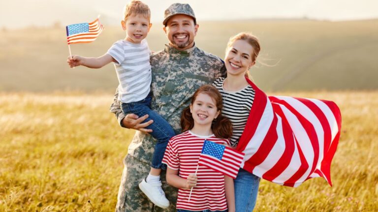 Soldier with Family and American Flag in a Field
