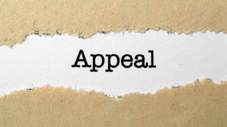 Appeal Typed on a Document Shown by Rip in Cover Page