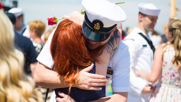 Navy Veteran Hugging Girl