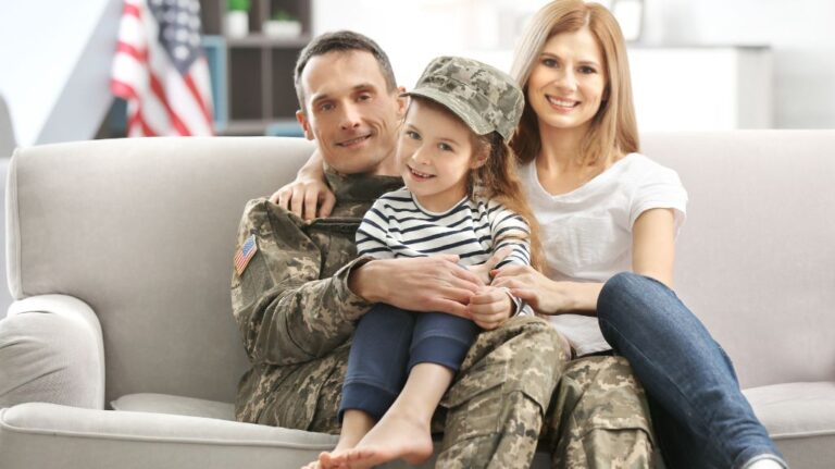 Veteran with Eye Issues with His Family on a Couch