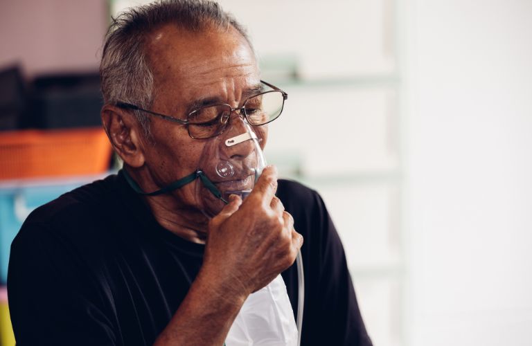 Older Man Using Oxygen