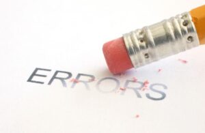 Pencil Erasing Error Text on Paper