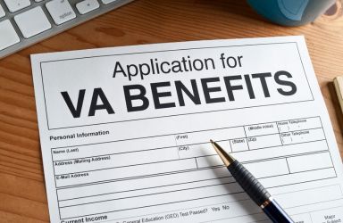 VA Benefits Application Document on Desk