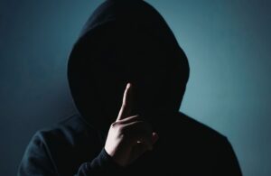 Thief in Black with Shhhhh Finger