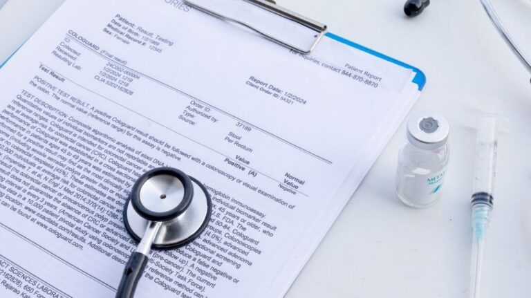 Medical Exam Results on a Clipboard with a Stethoscope