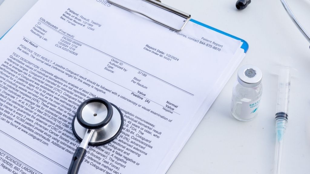 Medical Exam Results on a Clipboard with a Stethoscope